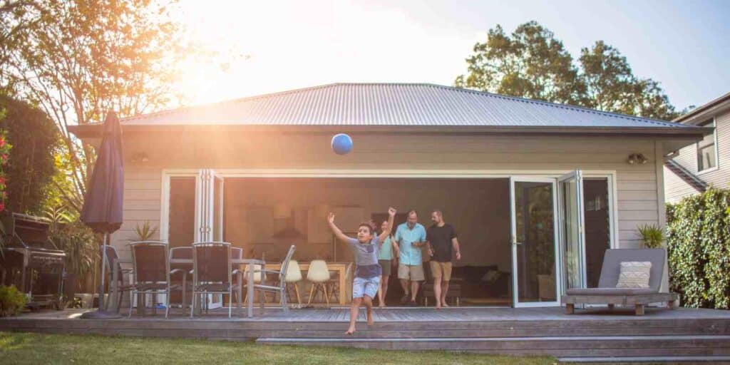family playing in yard