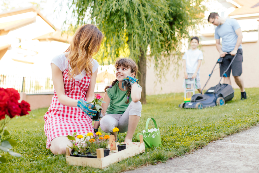 Family doing yard work in spring.