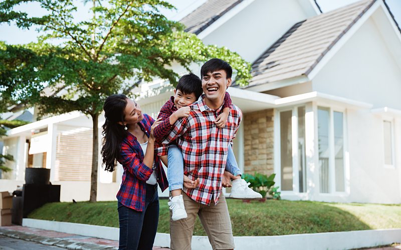 family outside a home 