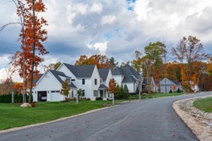 residential house with colorful autumn trees